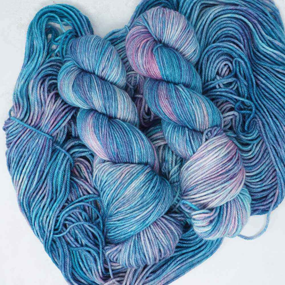 Mermaid Tales hand dyed yarn colourway shown on Squishy DK b base | Market Town Yarns