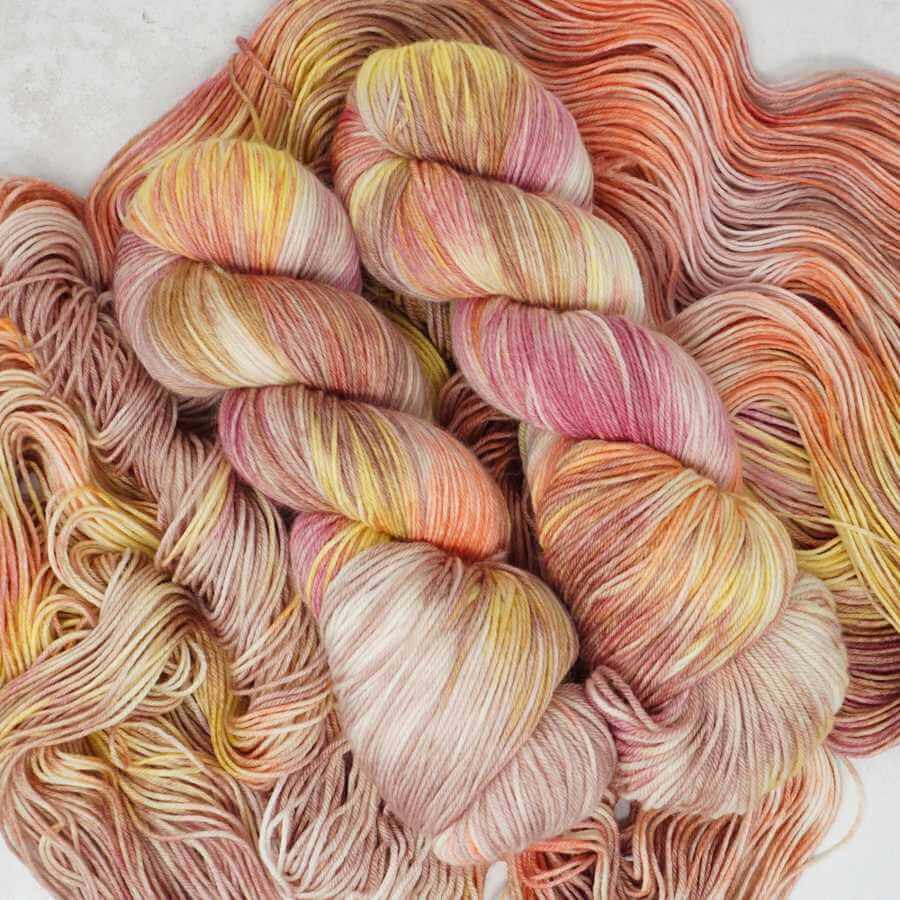 Blush & Bloom hand dyed yarn colourway shown on Squishy Sock base | Market Town Yarns