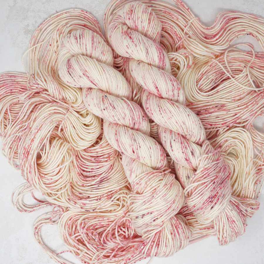Cherry Blossom Kiss hand dyed yarn colourway shown on Cotton Merino Classic DK base | Market Town Yarns