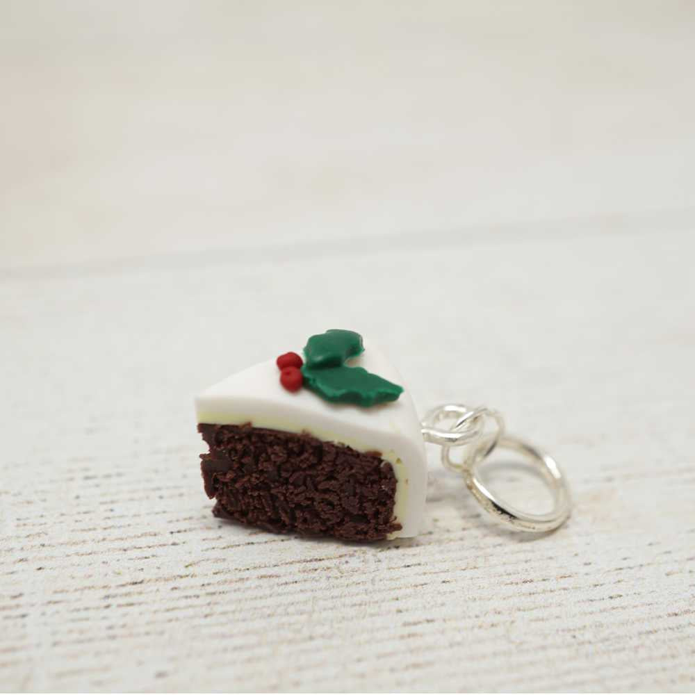 Handmade Polymer Clay Stitch Marker / Progress Keeper - Christmas Cake shown with fixed ring fitting | Market Town Yarns