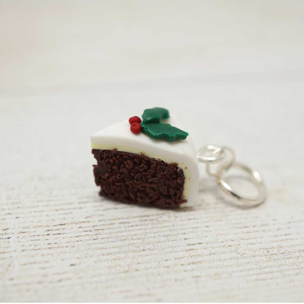 Handmade Polymer Clay Stitch Marker / Progress Keeper - Christmas Cake shown with fixed ring fitting | Market Town Yarns