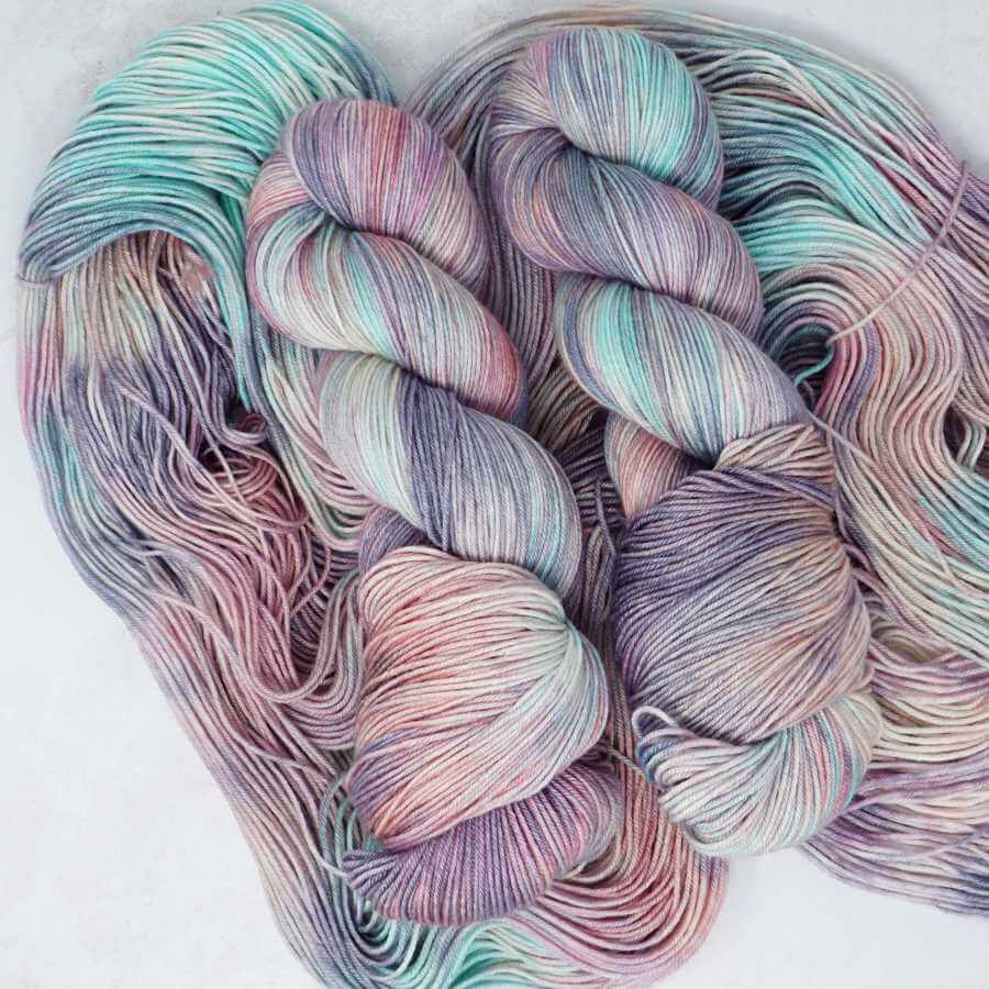 Ice Blast hand-dyed yarn by Market Town Yarns in frosted aqua, soft lavender, icy pink and silvery pastel tones