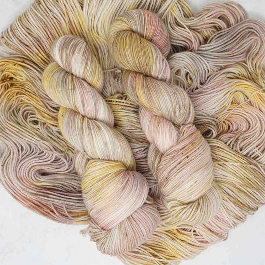 Sandy Sundae hand dyed yarn in soft sand, cream and blush pink tones | Market Town Yarns