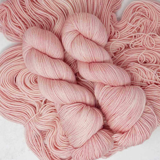 She Said Yes! | Hand dyed yarn shown on Squishy Sock Base | Market Town Yarns