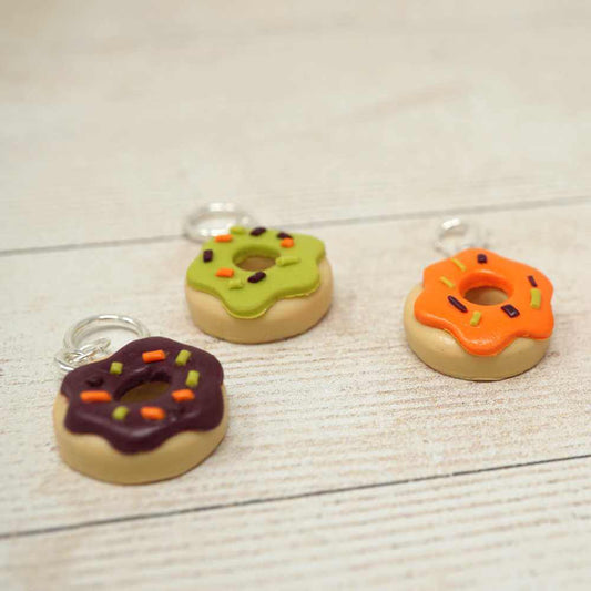 Handmade Polymer Clay Stitch Marker / Progress Keeper - Orange Ghoulish Doughnut | Market Town Yarns