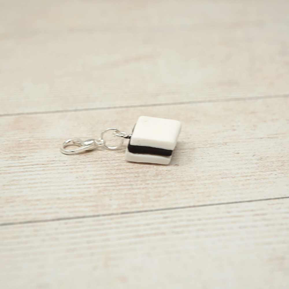 Handmade Polymer Clay Stitch Marker / Progress Keeper - White Liquorice Allsort | Market Town Yarns