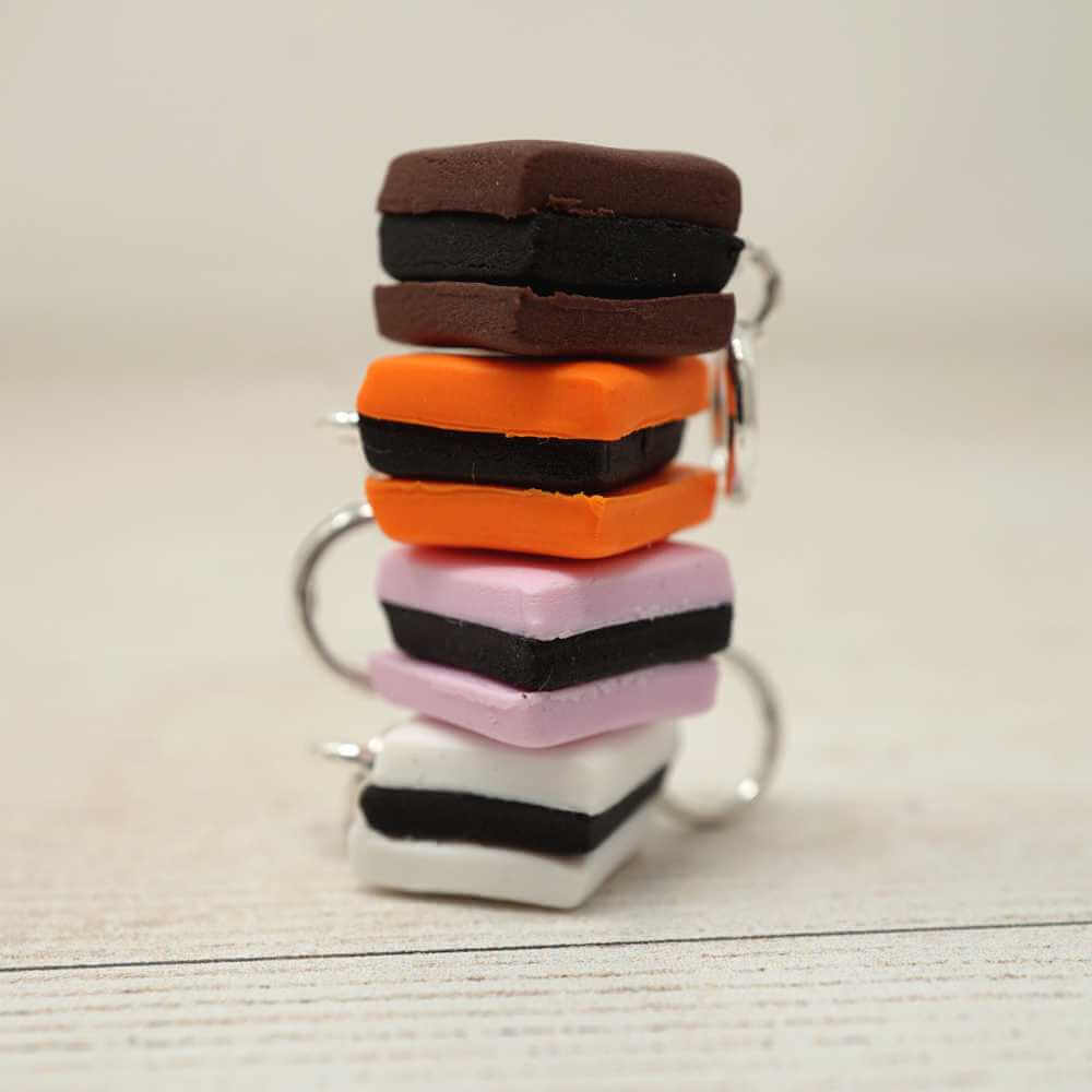 Handmade Polymer Clay Stitch Marker / Progress Keeper - Orange Liquorice Allsort | Market Town Yarns