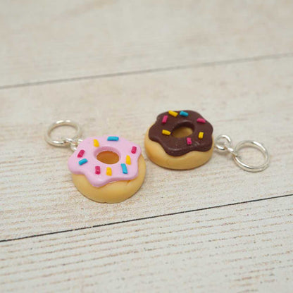 Two donut-shaped keychains with sprinkles on a light wooden surface | Market Town Yarns