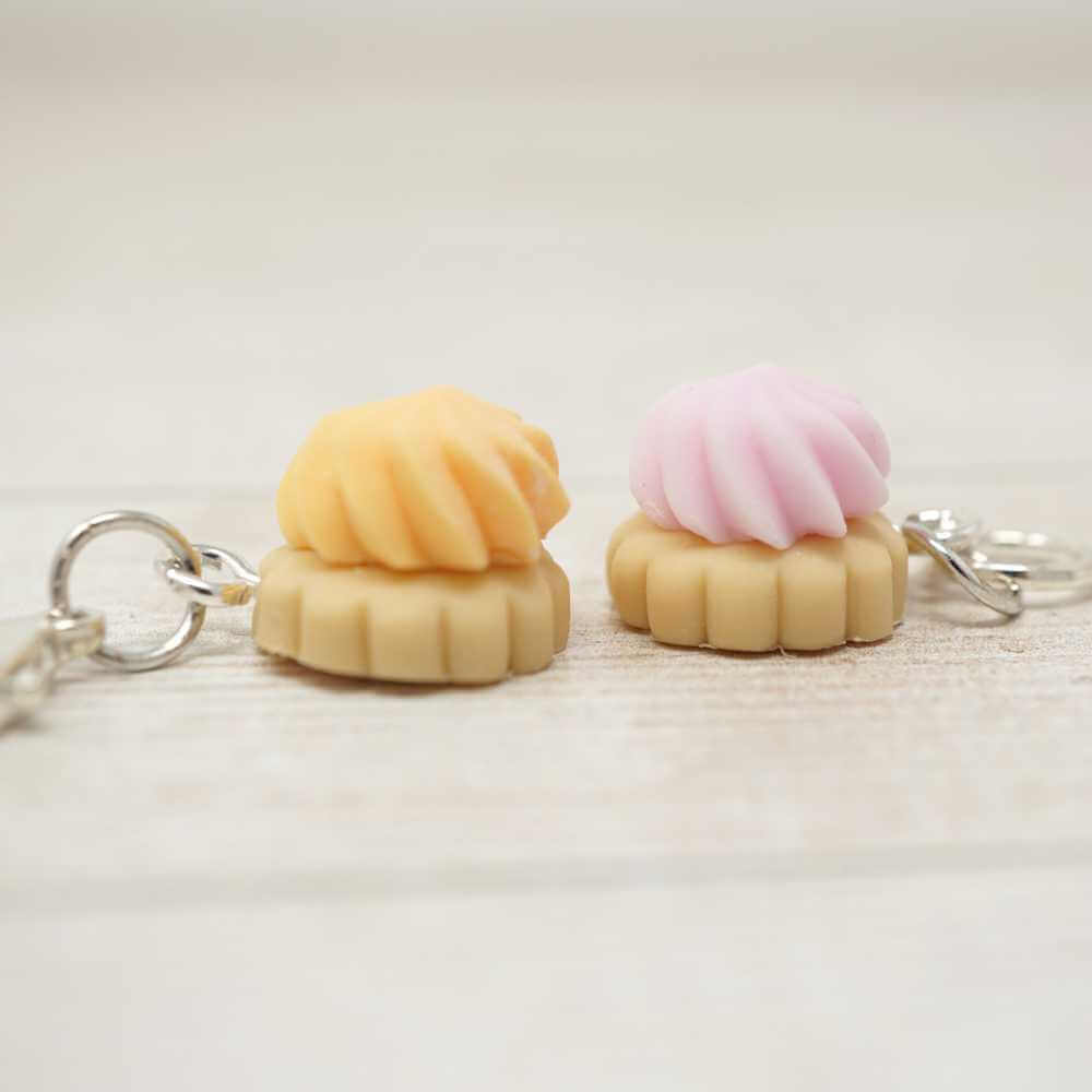 Two small keychains shaped like ice cream cones with pink and yellow tops on a white background | Market Town Yarns