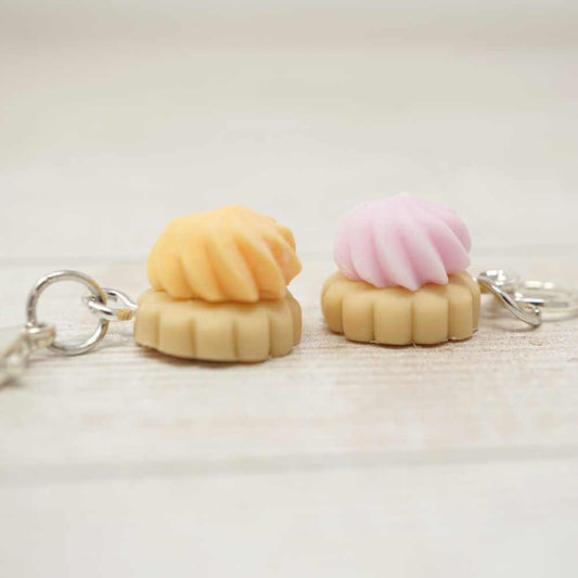 Two small keychains shaped like ice cream cones with pink and yellow tops on a light background | Market Town Yarns