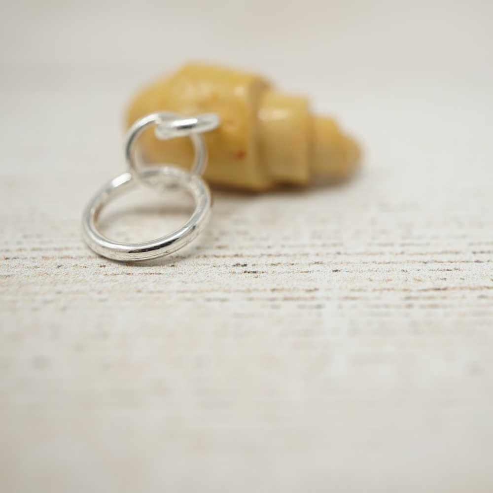 Handmade Polymer Clay Stitch Marker / Progress Keeper - Croissant | Market Town Yarns