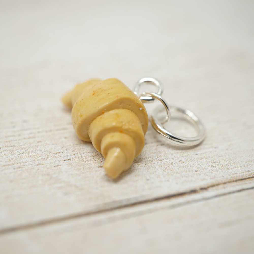 Handmade Polymer Clay Stitch Marker / Progress Keeper - Croissant | Market Town Yarns